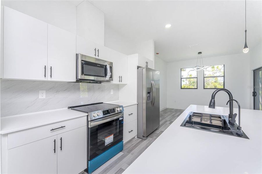 Furnished interior view inside a new home in , Port Charlotte (Image 40).