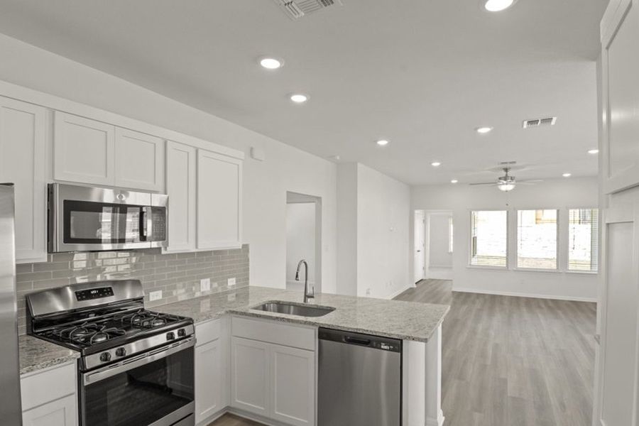 Representative furnished interior of a home built from the Frisco by Pacesetter Homes in Blanco Vista, San Marcos (Image 9).