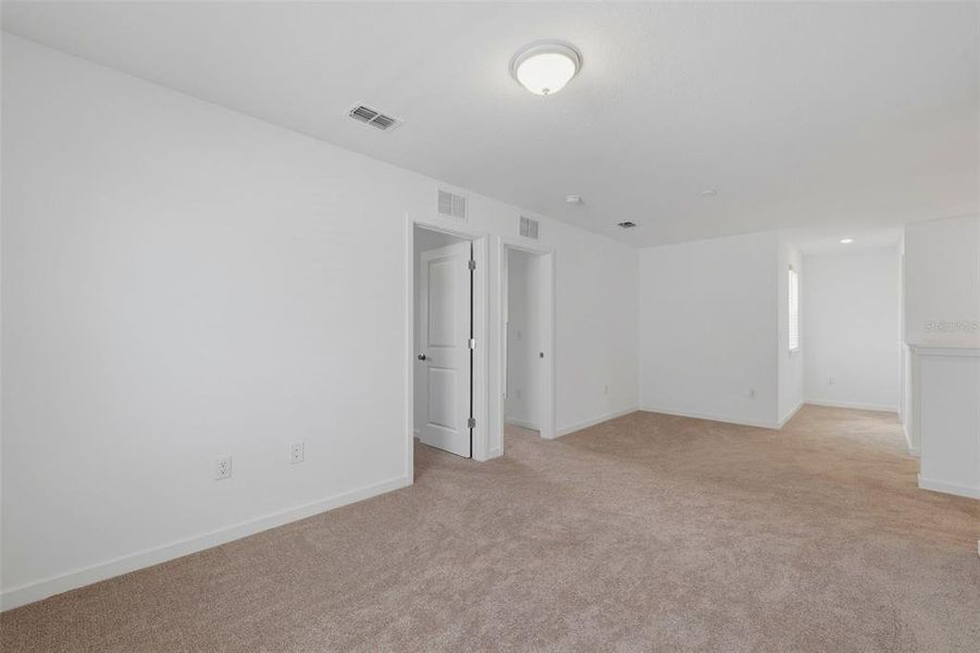 Spacious, unfurnished interior of a new home in Oakfield Lakes, Parrish (Image 24).