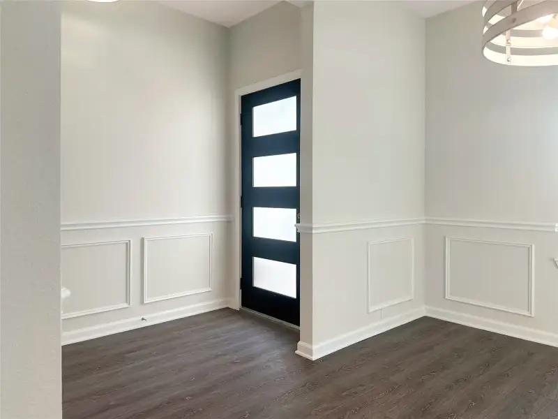 The Caldwell- Foyer and Dining Room. Home is under construction. Sample image for illustration; upgrades, options, and colors may vary.