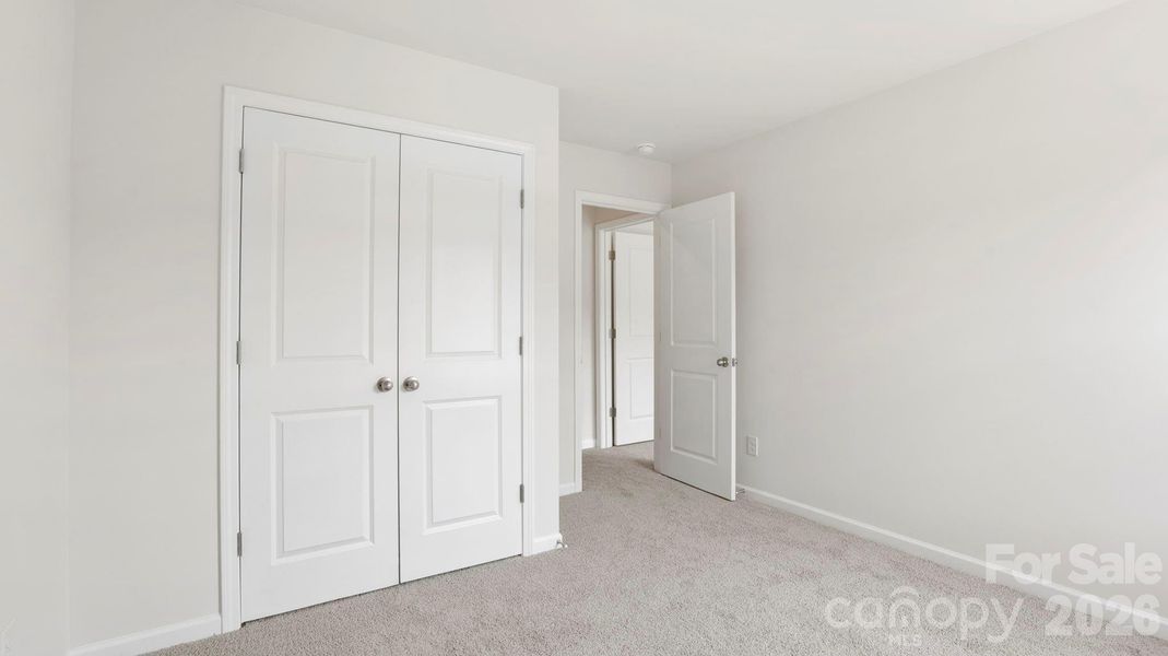 Spacious, unfurnished interior of a new home in Wildbrook Village, Waynesville (Image 29).