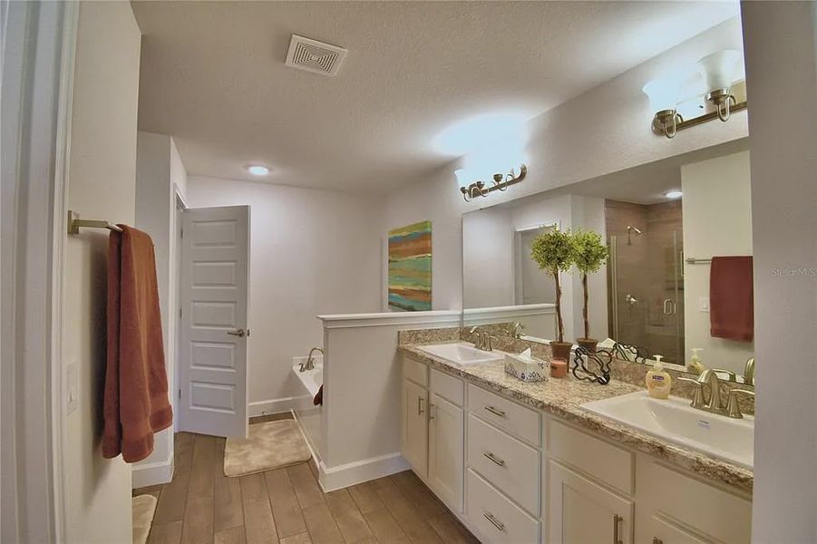 Furnished interior view inside a new home in Magnolia Park, Haines City (Image 31).