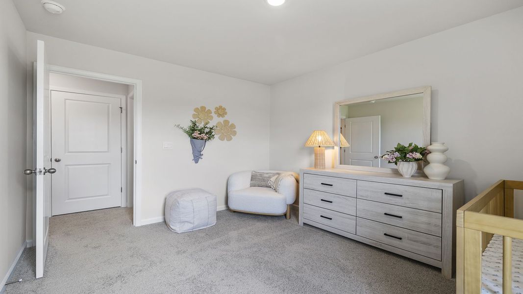 Furnished interior view inside a new home in Bentley Park, Greenwood (Image 25).