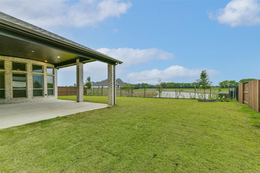 Front exterior of a new home in , Manvel, TX, highlighting curb appeal (Image 21). Front exterior of a new home in , Manvel, TX, highlighting curb appeal (Image 21).