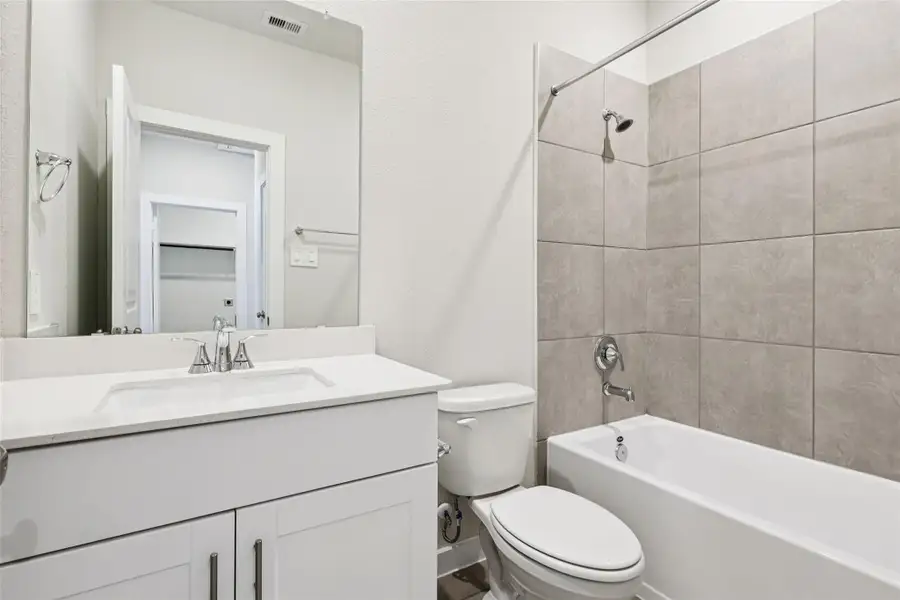 Furnished interior view inside a new home in Pinewood Trails - City Series, Atascocita (Image 13).