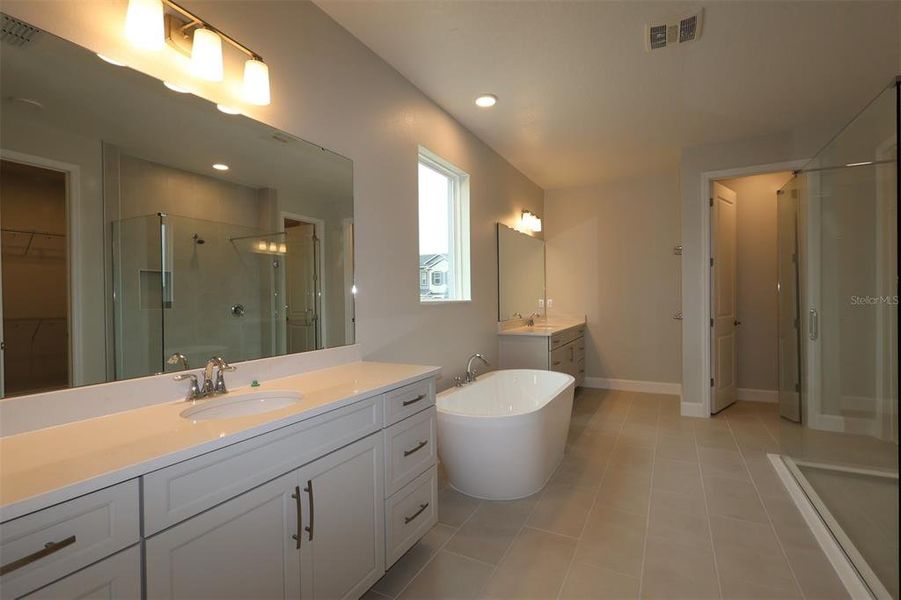 Furnished interior view inside a new home in Emerson Pointe, Apopka (Image 7). Furnished interior view inside a new home in Emerson Pointe, Apopka (Image 7).