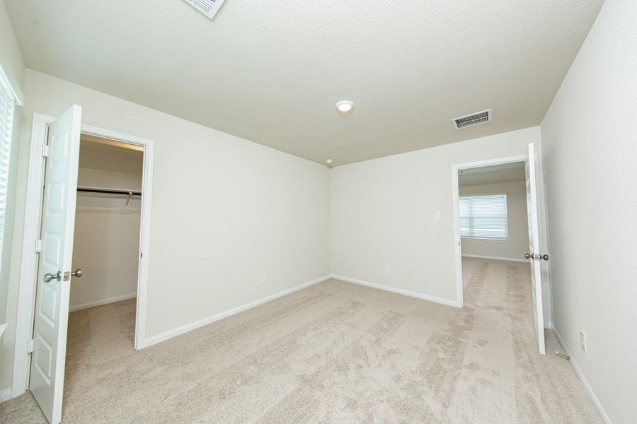 Spacious, unfurnished interior of a new home in River's Edge, Conroe (Image 23). Spacious, unfurnished interior of a new home in River's Edge, Conroe (Image 23).