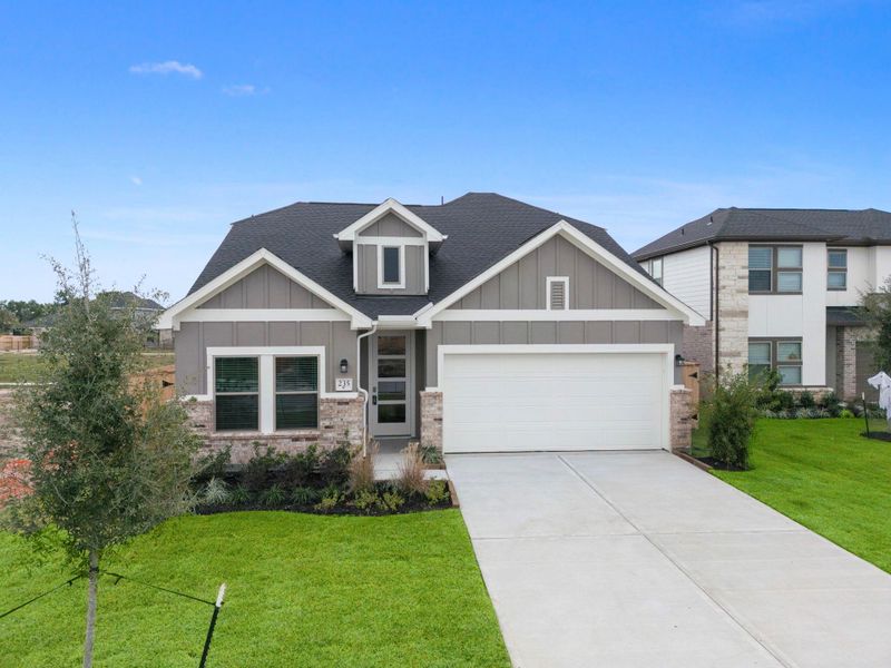 Front exterior of a new home in Laurel Landing 40', Alvin, TX, highlighting curb appeal (Image 18). Front exterior of a new home in Laurel Landing 40', Alvin, TX, highlighting curb appeal (Image 18).