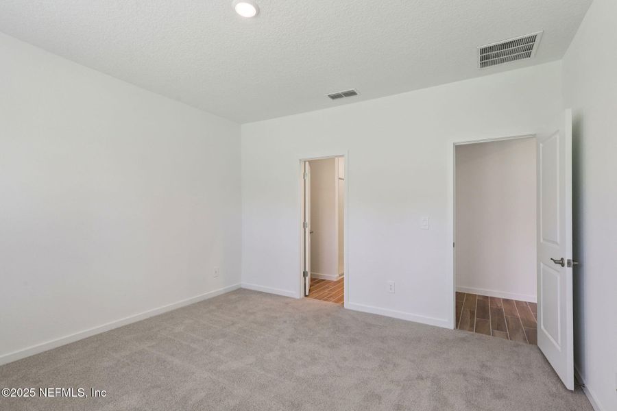 Spacious, unfurnished interior of a new home in Colbert Landings, Palm Coast (Image 20).