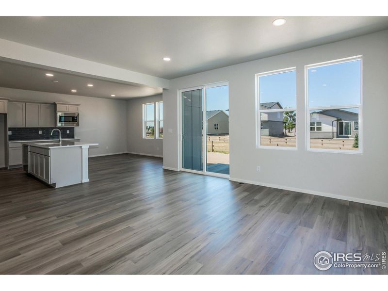 LIVING ROOM, DINING ROOM AND KITCHEN