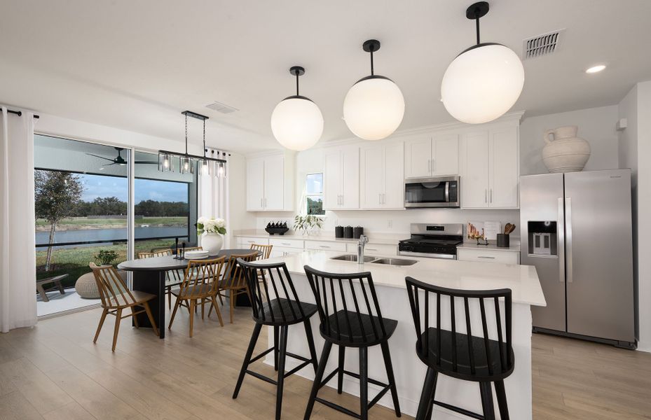 Representative furnished interior of a home built from the Pinecrest by Pulte Homes in Riversong, Parrish (Image 17).