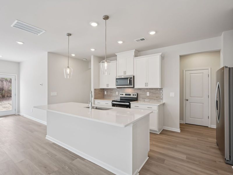 Furnished interior view inside a new home in Hawthorne Station, College Park (Image 6).