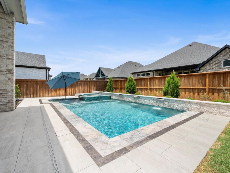Exterior details and patio area of a home in , Spring (Image 4).