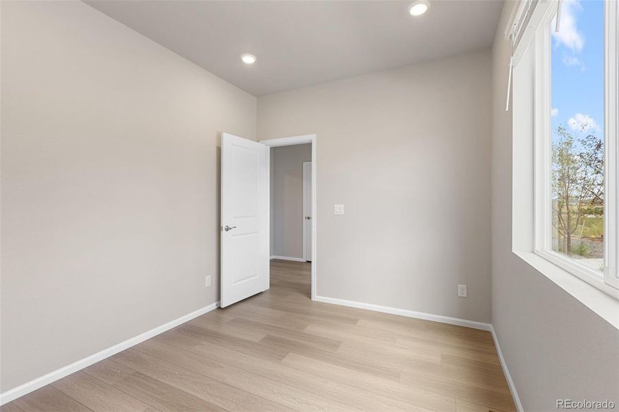 Spacious, unfurnished interior of a new home in Woodrose at Painted Prairie, Aurora (Image 23).