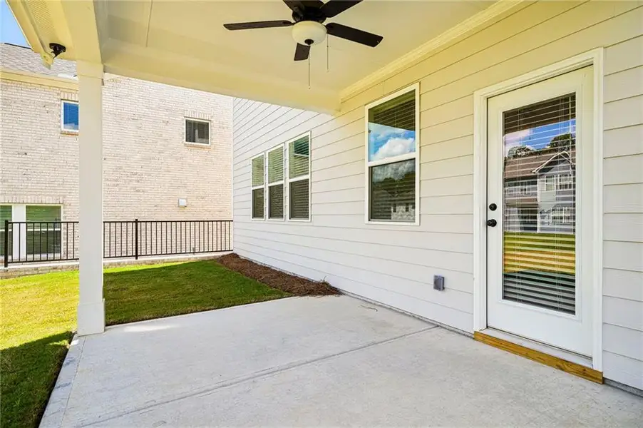 Exterior details and patio area of a home in Auburn Glen, Dacula (Image 3).
