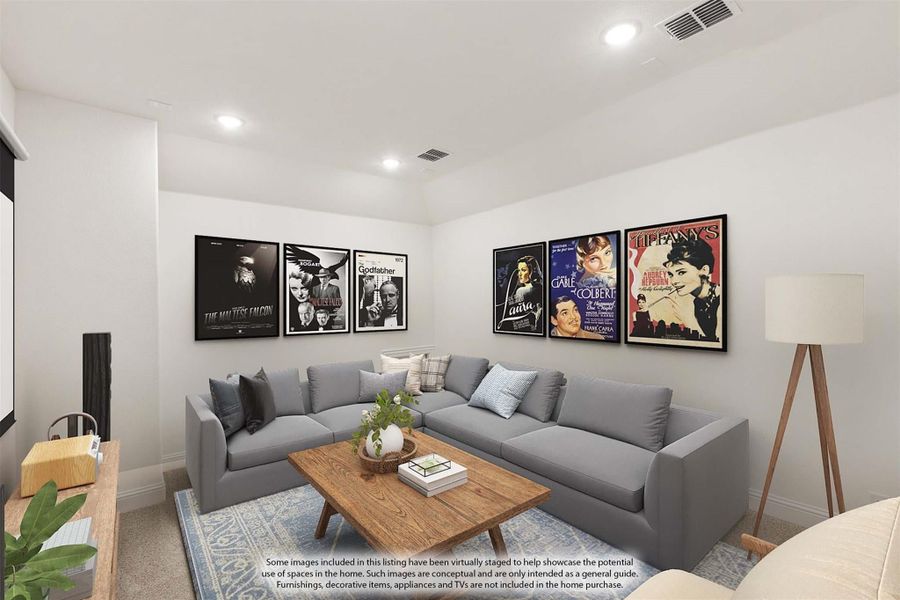Media room with gray sectional sofa, wood coffee table, and classic movie posters on white walls
