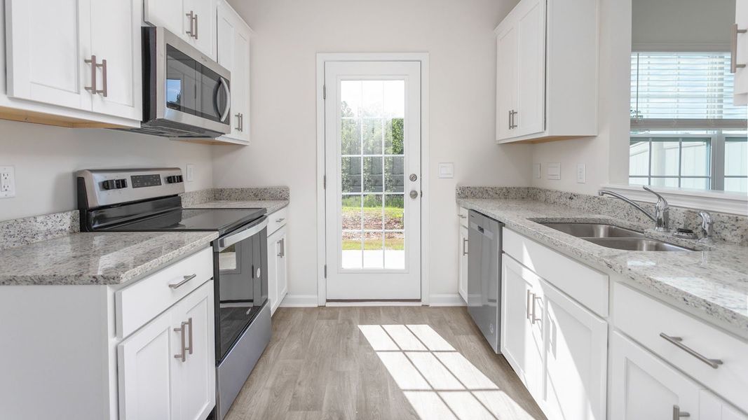 Representative furnished interior of a home built from the NEWTON by D.R. Horton in Henley Ridge, Graham (Image 5).