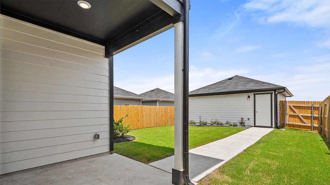 Representative exterior photo of a completed home built from the The Madeline by D.R. Horton in Valverde, Bastrop, TX (Image 22). Representative exterior photo of a completed home built from the The Madeline by D.R. Horton in Valverde, Bastrop, TX (Image 22).
