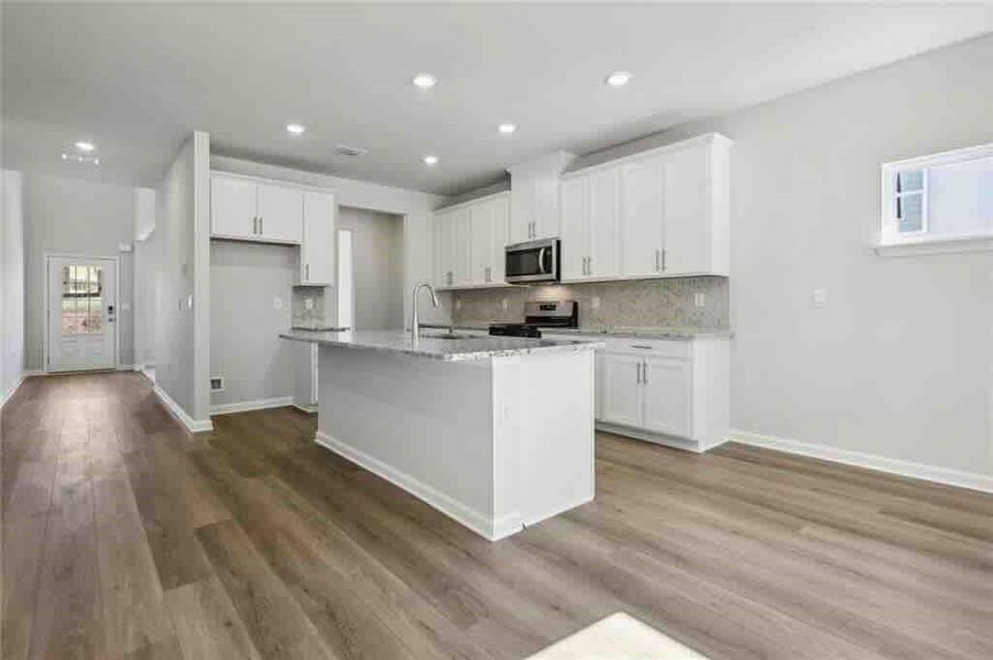 Furnished interior view inside a new home in Parkside at Grayson, Grayson (Image 11).