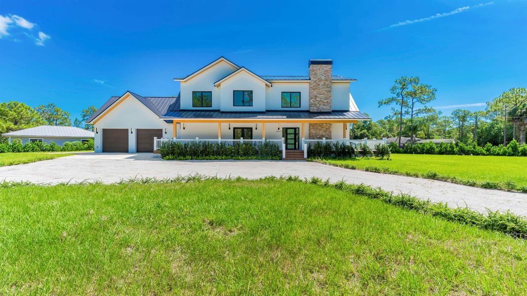 Front exterior of a new home in , Jupiter, FL, highlighting curb appeal (Image 17).