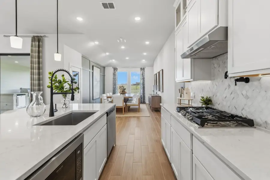 Representative furnished interior of a home built from the Lubbock by First America Homes in Alamo Estates, San Antonio (Image 9).