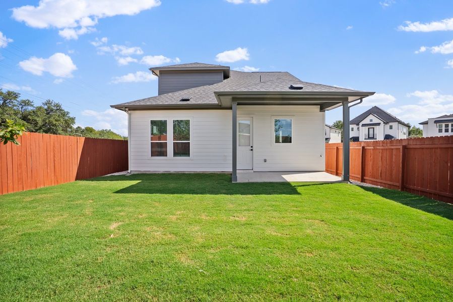 Front exterior of a new home in Foxfield, Austin, TX, highlighting curb appeal (Image 14).