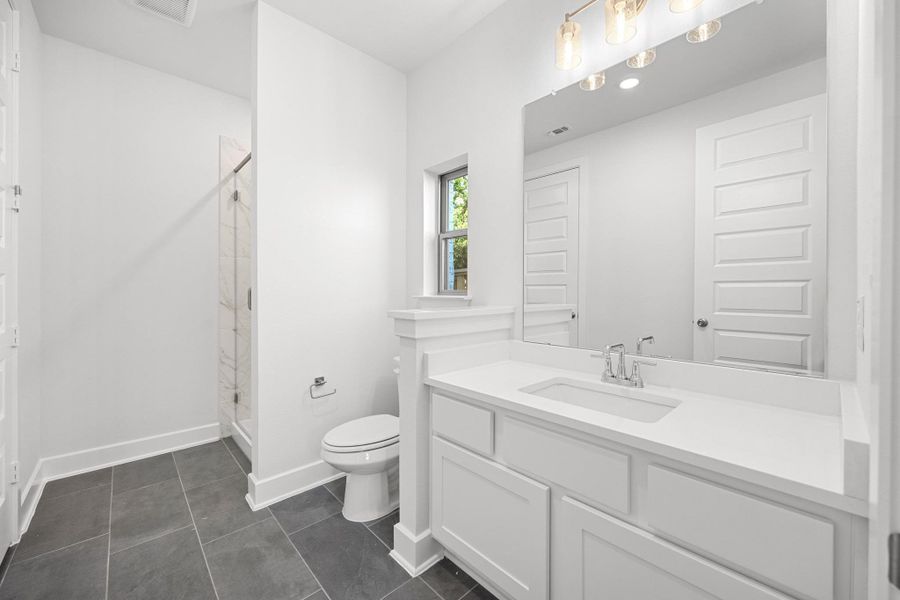 Furnished interior view inside a new home in Parmer Ranch, Georgetown (Image 11).