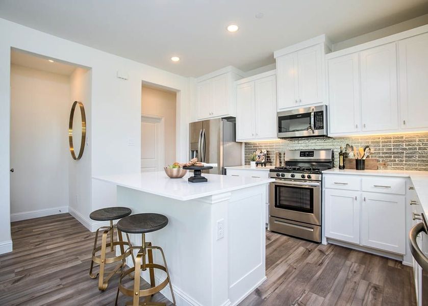 Image 10 representing the Dogwood by CB JENI Homes in The Grove, Frisco, TX.