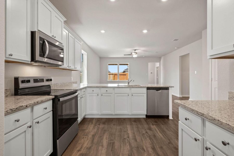 Furnished interior in a model home at Vacek Country Meadows in Richmond (Image 2). Furnished interior in a model home at Vacek Country Meadows in Richmond (Image 2).