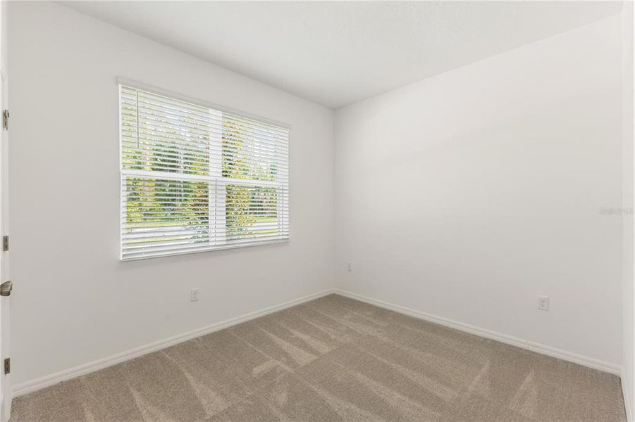 Spacious, unfurnished interior of a new home in Mirror Lake Village, Fruitland Park (Image 22).