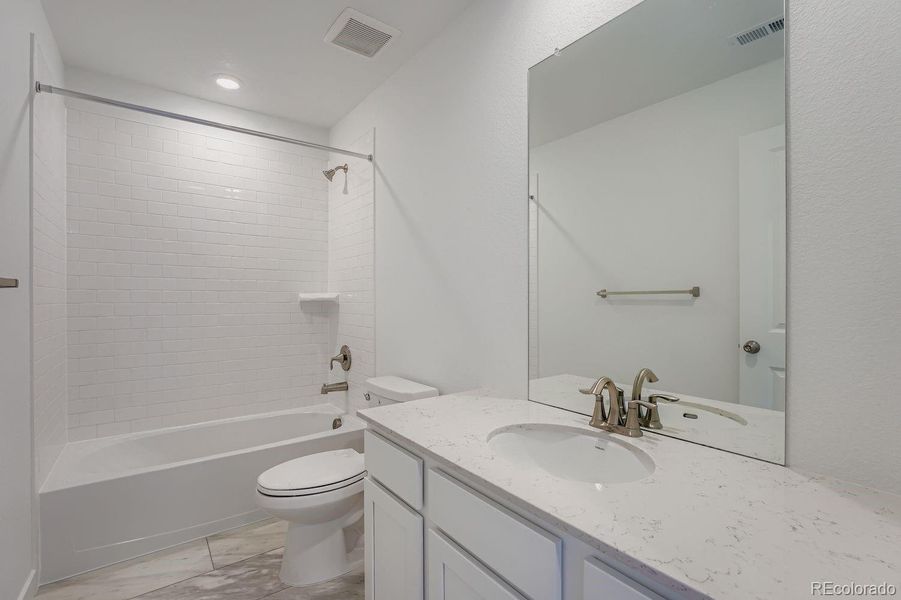 Furnished interior in a model home at Brighton Crossings: The Grand Collection in Brighton (Image 21).