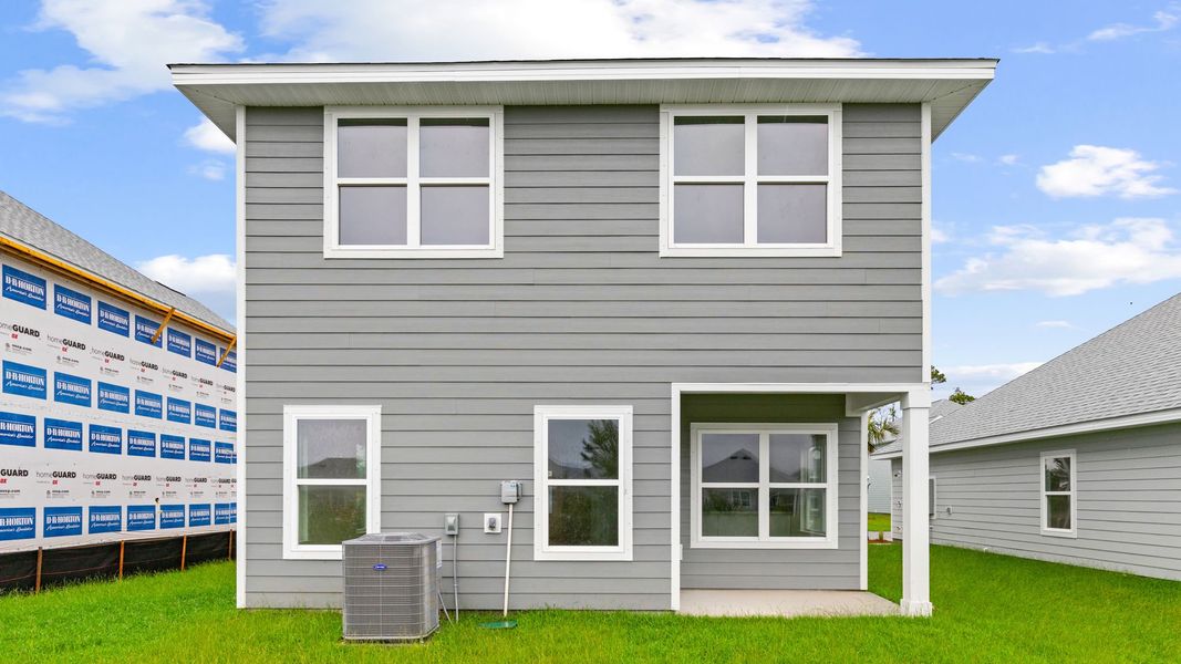 Exterior details and patio area of a home in WindMark Beach, Port Saint Joe (Image 25).