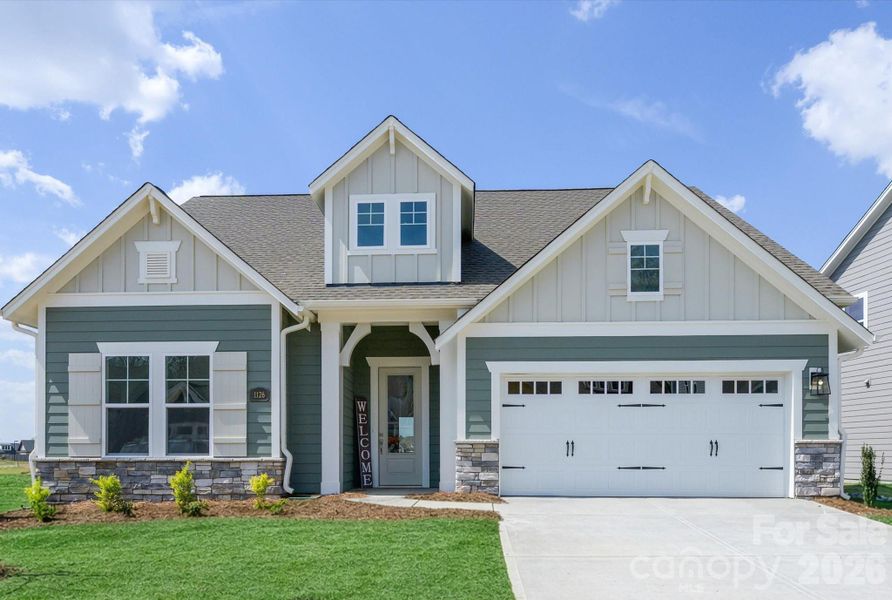 Front exterior of a new home in Encore at Streamside - Tradition Series, Waxhaw, NC, highlighting curb appeal (Image 23).