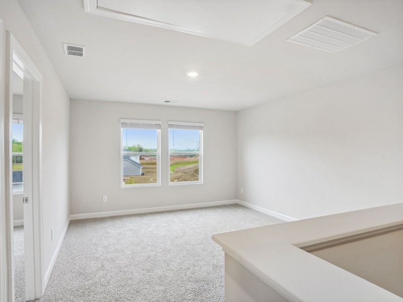 Turn the loft into a game room or lounge space for movie nights.