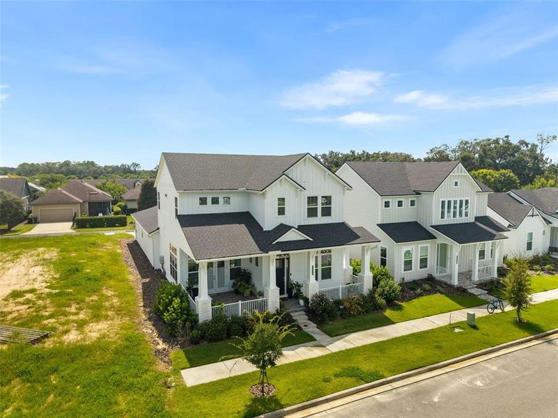 Front exterior of a new home in Oakmont, Gainesville, FL, highlighting curb appeal (Image 2). Front exterior of a new home in Oakmont, Gainesville, FL, highlighting curb appeal (Image 2).