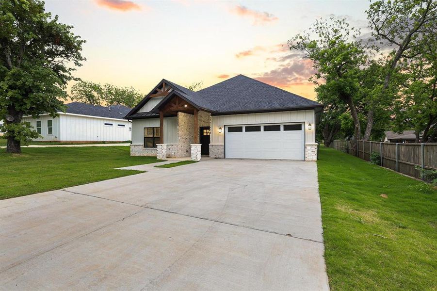 Front exterior of a new home in , Denison, TX, highlighting curb appeal (Image 24).