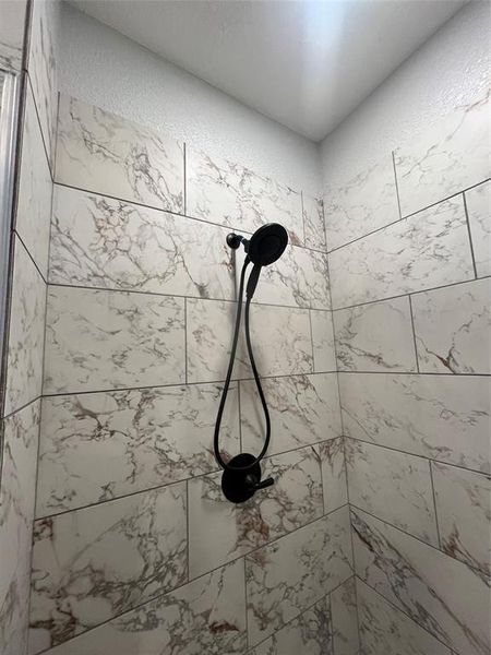 Bathroom view of tiled shower Bathroom view of tiled shower