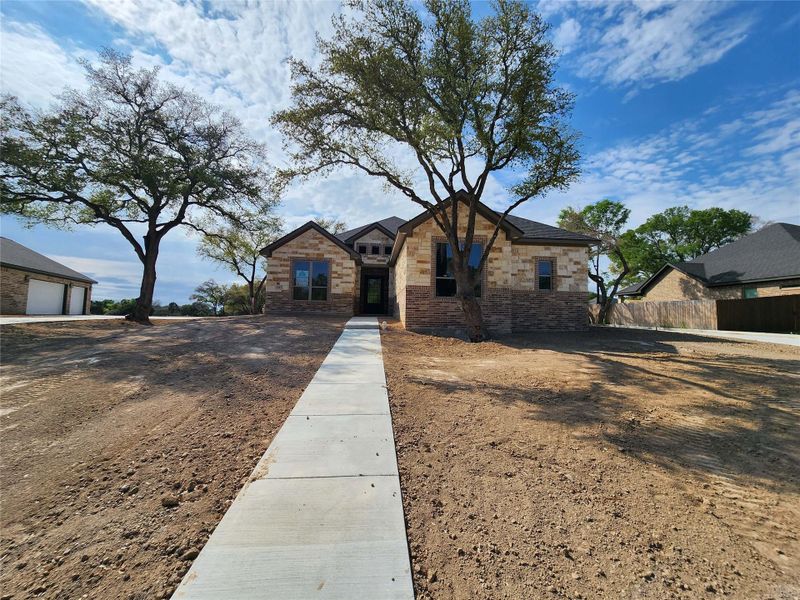 View of front of house featuring stone siding