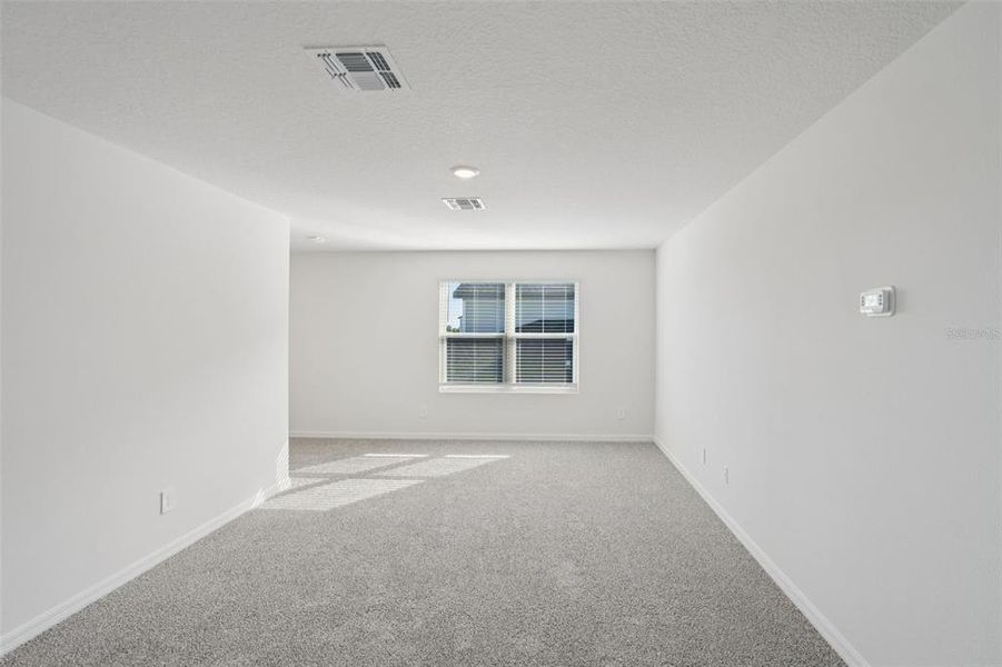 Spacious, unfurnished interior of a new home in Crosswinds - Classic Series, Haines City (Image 14).