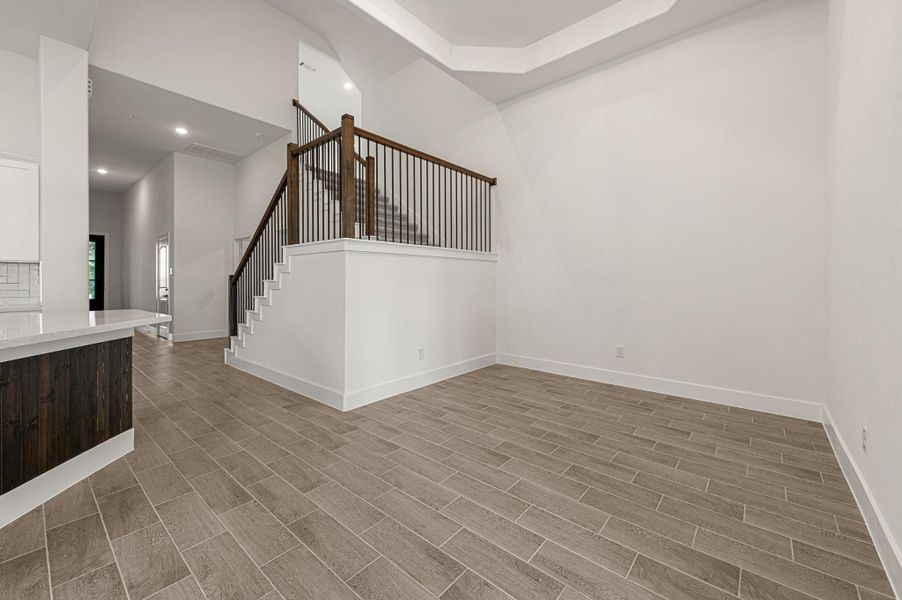 Dining room boasts a beautiful rotunda that brings elegance to this home.