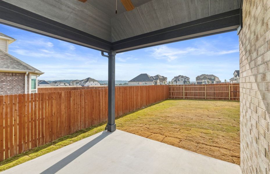 Exterior details and patio area of a home in Saddleback at Santa Rita Ranch, Liberty Hill (Image 3).