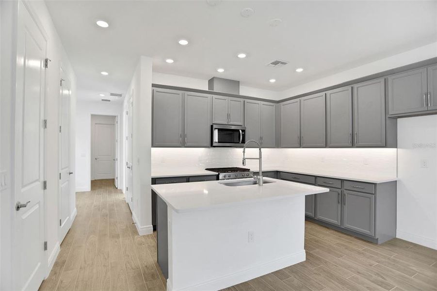 Furnished interior view inside a new home in Bungalow Walk at Lakewood Ranch, Sarasota (Image 9).