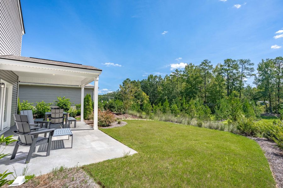 Exterior details and patio area of a home in Grand Arbor, Blythewood (Image 28).