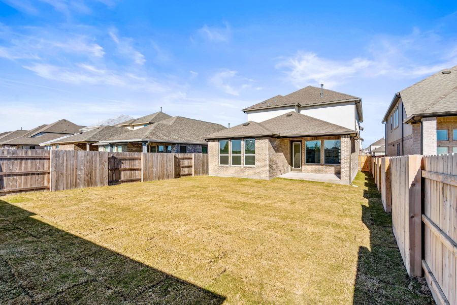 Exterior details and patio area of a home in Flora, Hutto (Image 25).