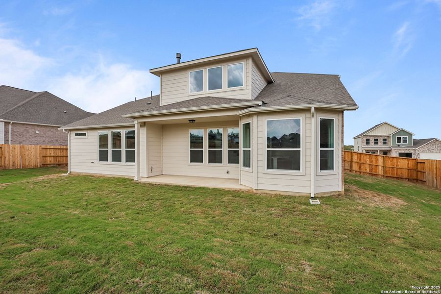 Exterior details and patio area of a home in Homestead 75', Schertz (Image 4).