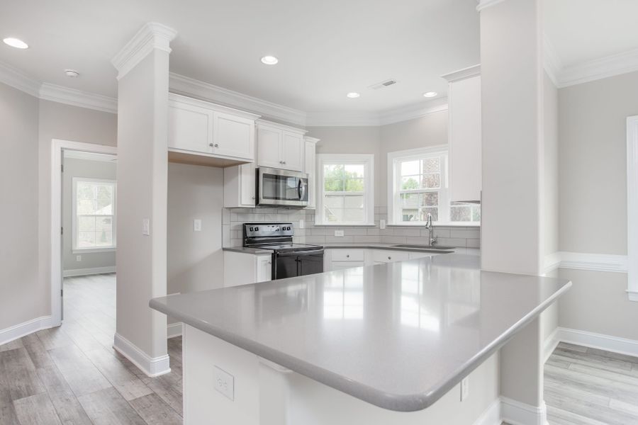 Representative furnished interior of a home built from the Kingston by Keystone Homes NC in Weybridge, Burlington (Image 15).