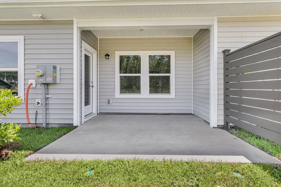 Exterior details and patio area of a home in Hammock Walk at Nexton, Summerville (Image 4).