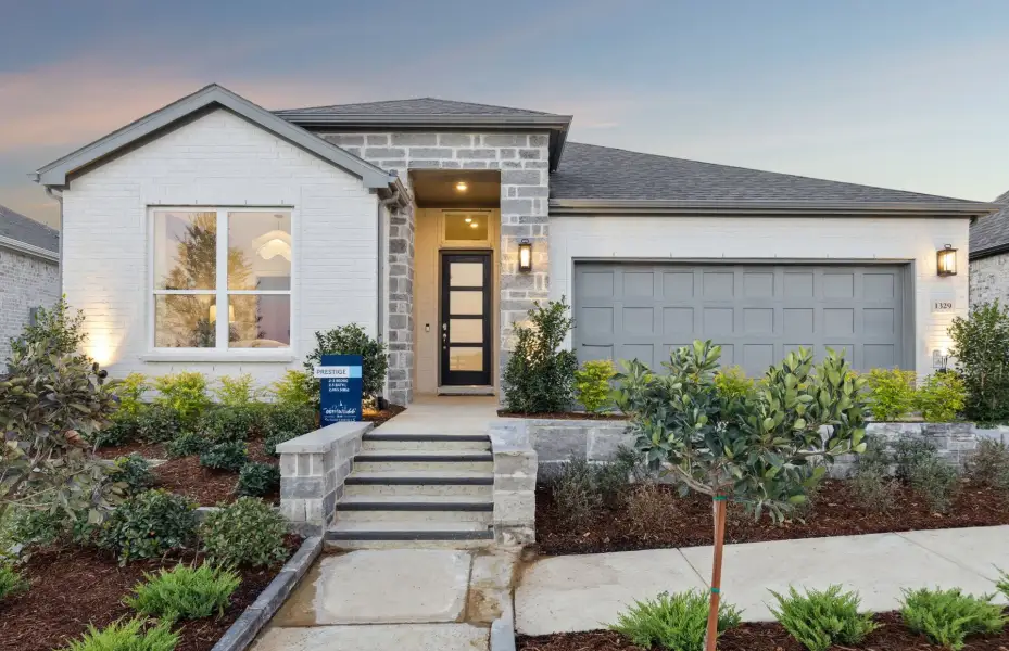 Front exterior of a new home in Del Webb at Legacy Hills, Celina, TX, highlighting curb appeal (Image 1). Front exterior of a new home in Del Webb at Legacy Hills, Celina, TX, highlighting curb appeal (Image 1).
