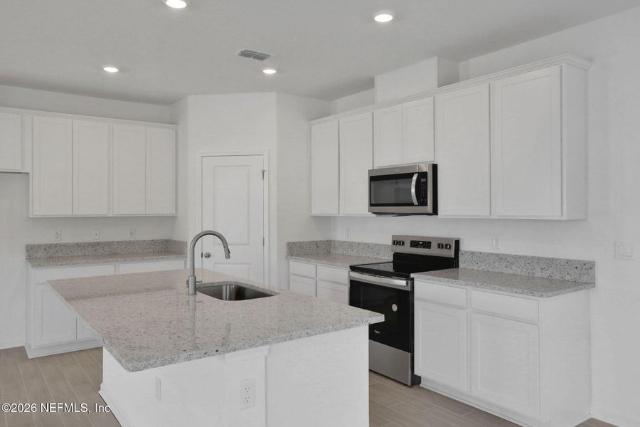Furnished interior view inside a new home in Amberly, Green Cove Springs (Image 9).
