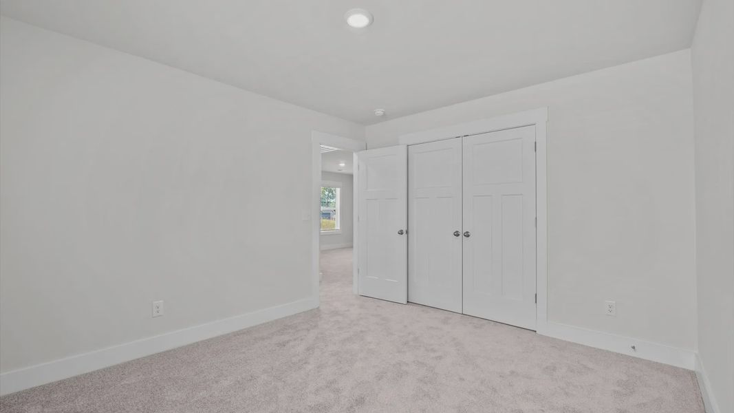 Representative unfurnished interior of a home built from the Jasmine by DRB Homes in Pleasant Falls, Moore (Image 31).